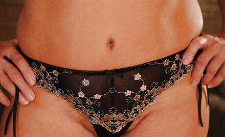 Hot granny Gigi M exhibits her butt in nice skirt and spreading her legs 